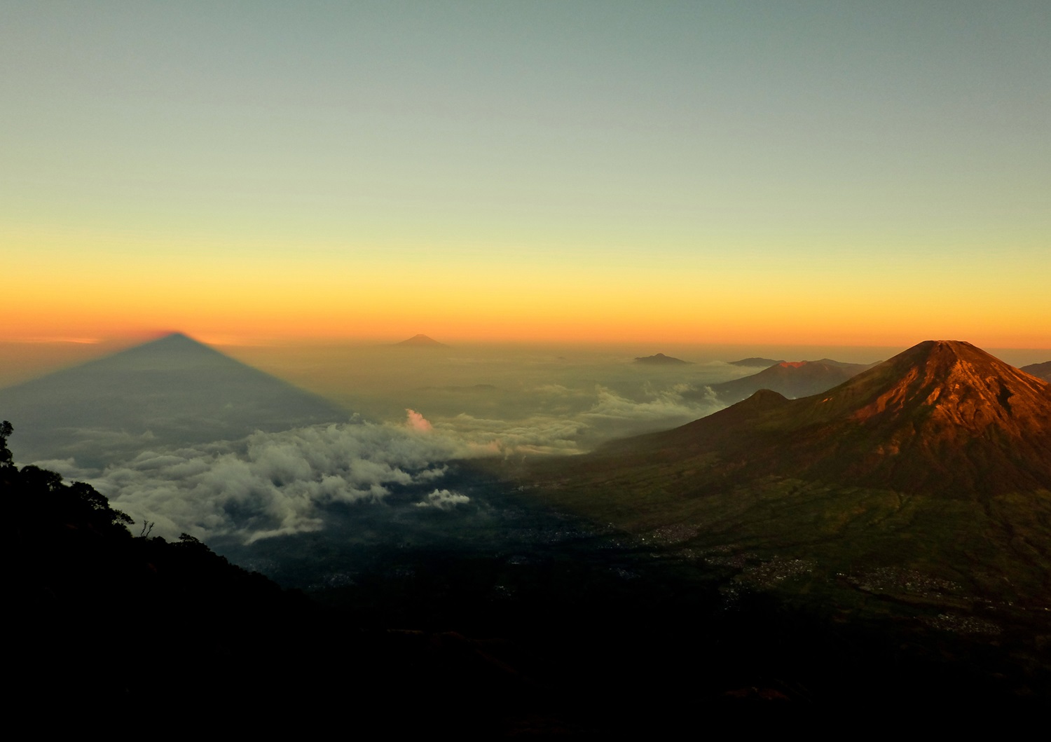 Volcanoes with sunset sky