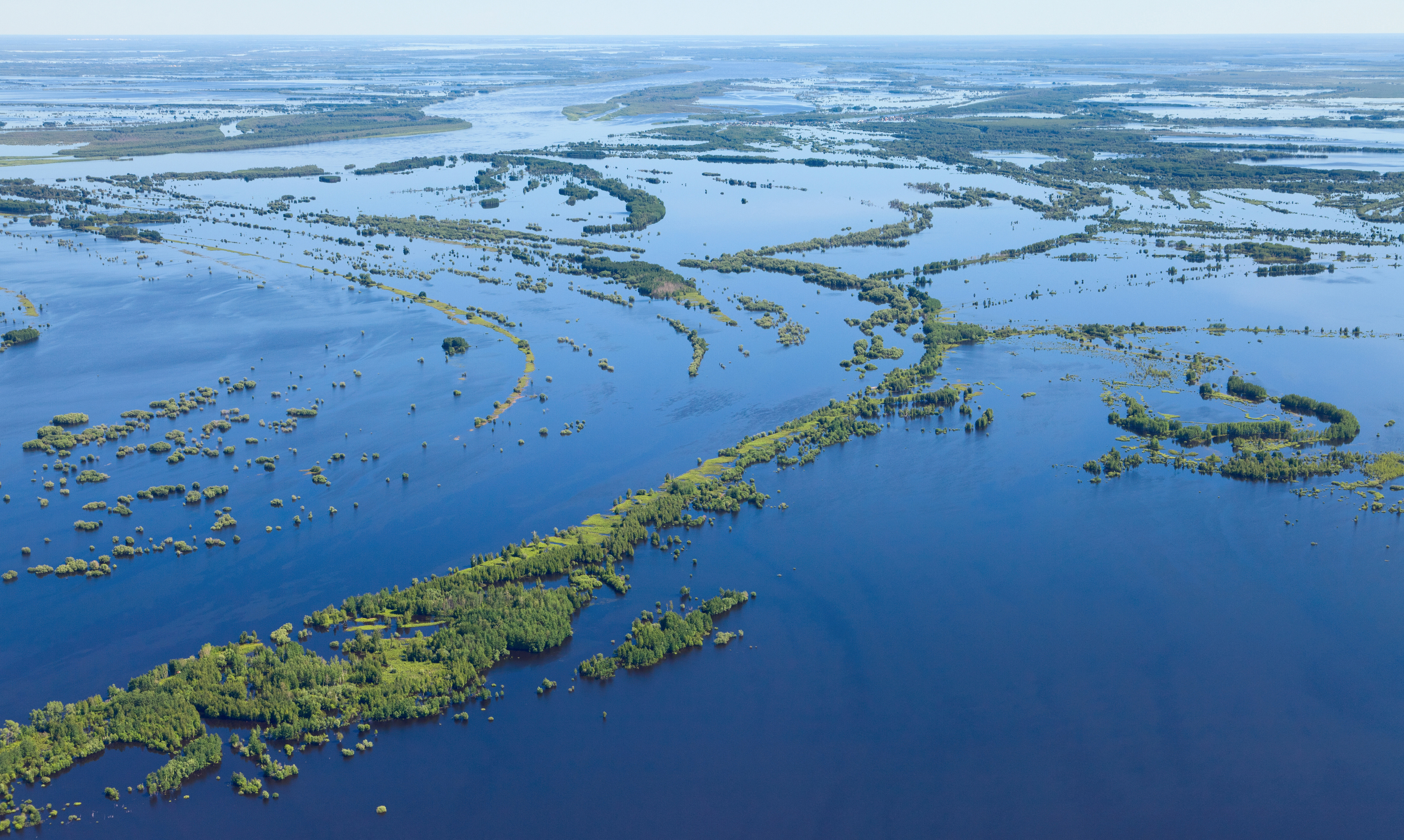 Flooding of bottom land of the Big Siberian river Ob in spring period, top view