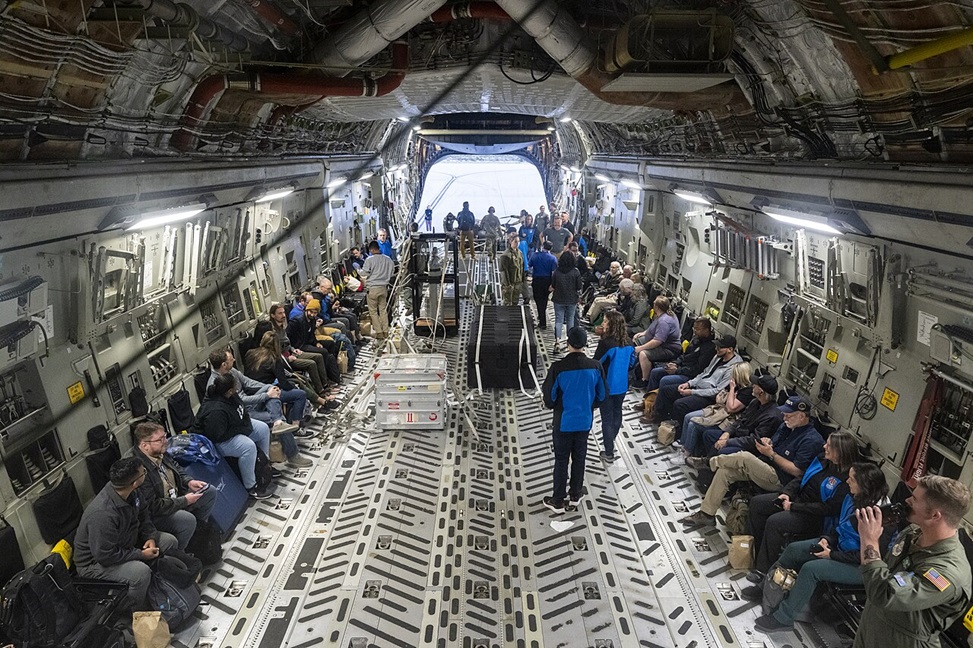 Recovery and curation teams join a container with the science canister from NASA’s OSIRIS-REx mission aboard a C-17 Globemaster aircraft, Monday, Sept. 25, 2023, at the Department of Defense's Utah Test and Training Range.