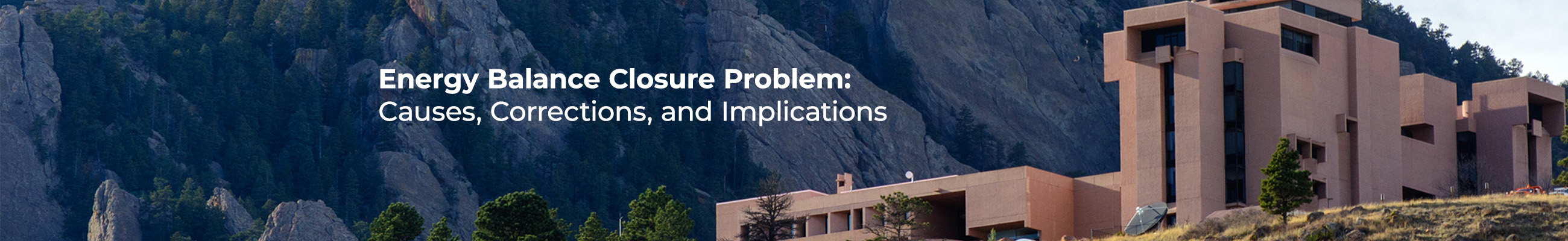 Sandstone building against a mountainous background. National Center for Atmospheric Research, Boulder, CO.