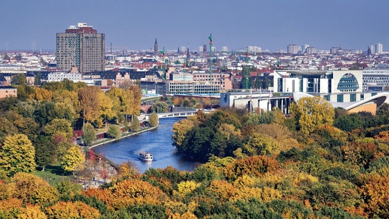 Aerial view of Berlin with River Spree and trees in foreground