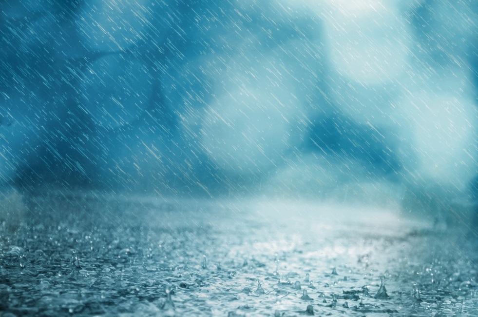 rain falling at night hitting pavement