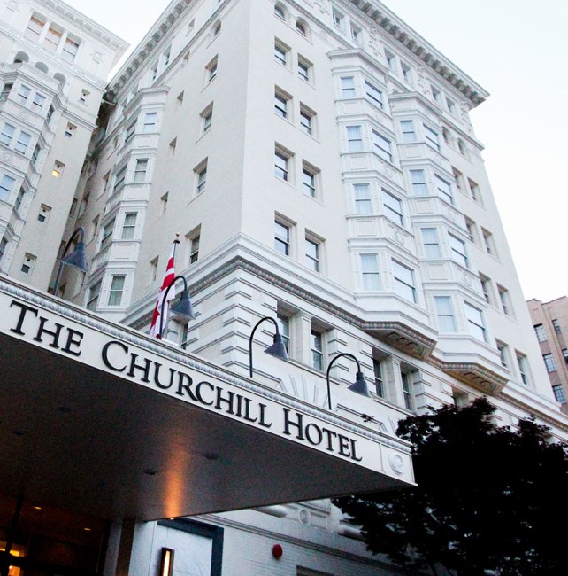Exterior of The Churchill Hotel, white Beaux-Arts style building in Washington, D.C.