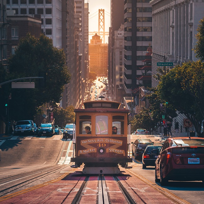 Street view of San Francisco trolley with buildings in background