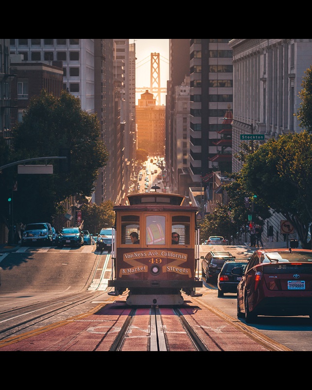 Street view of San Francisco trolley with buildings in background