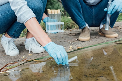 Scientist gathering water samples
