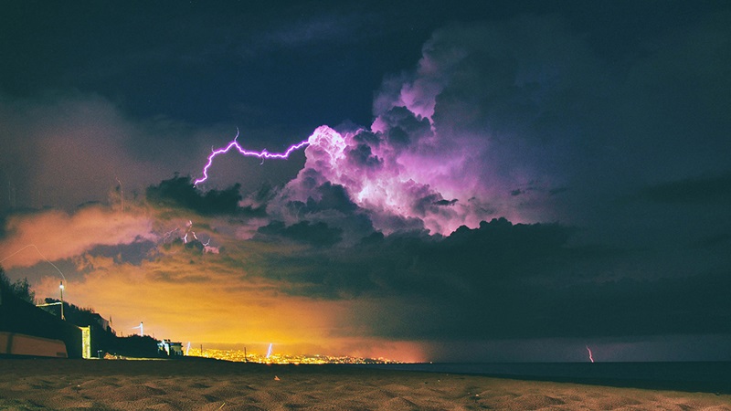 Clouds with bold of purple lightning