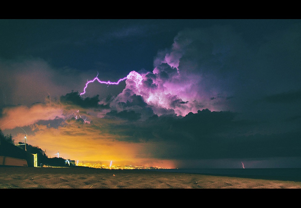 Clouds with bold of purple lightning