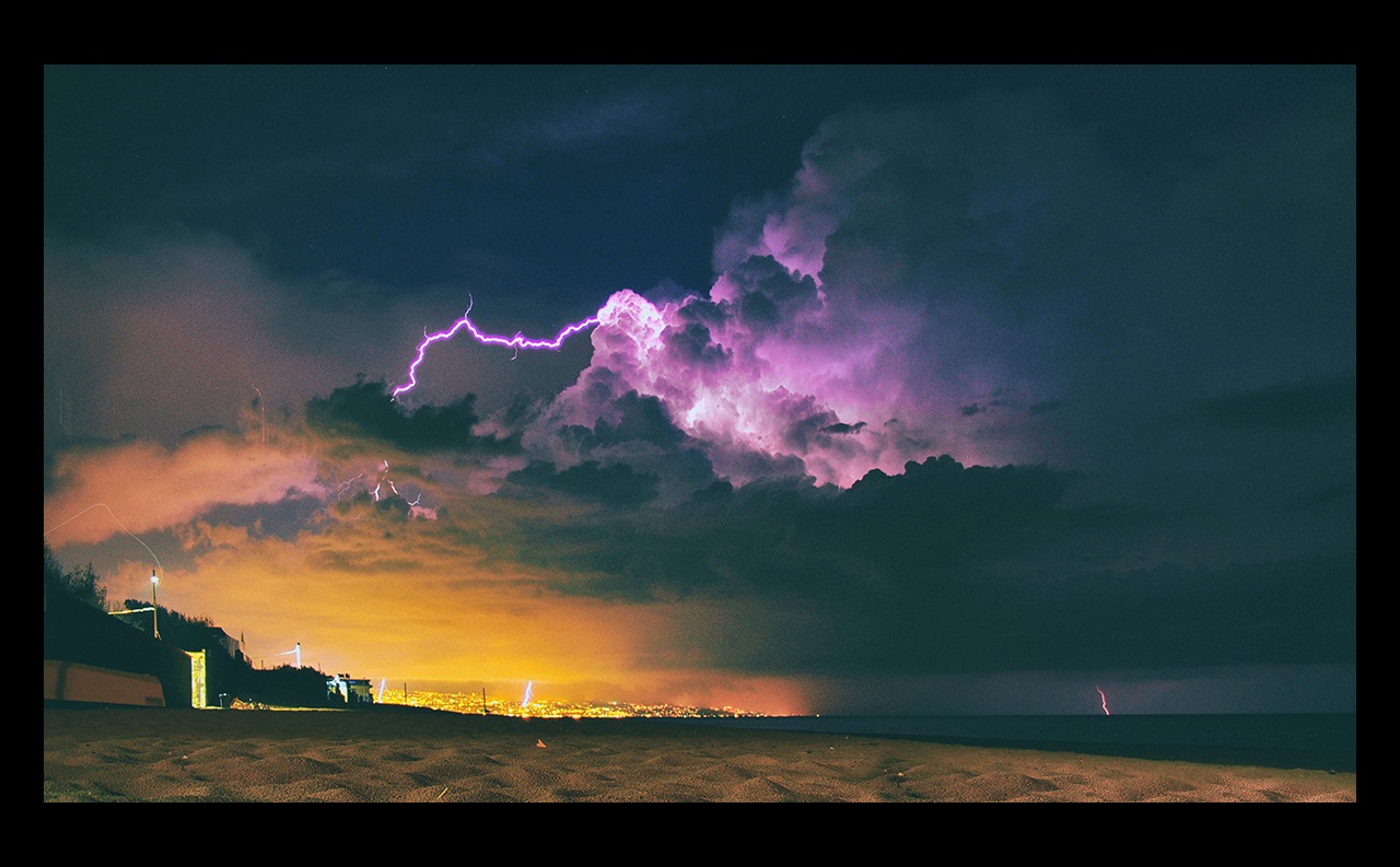 Clouds with bold of purple lightning