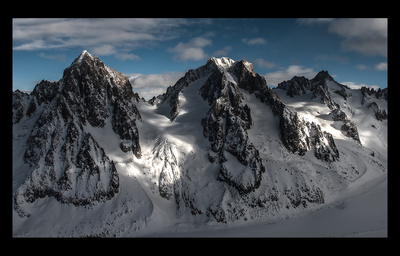 Snow and rock covered mountains