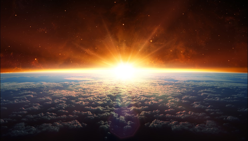 Photo of Earth's Stratosphere with sun rising 