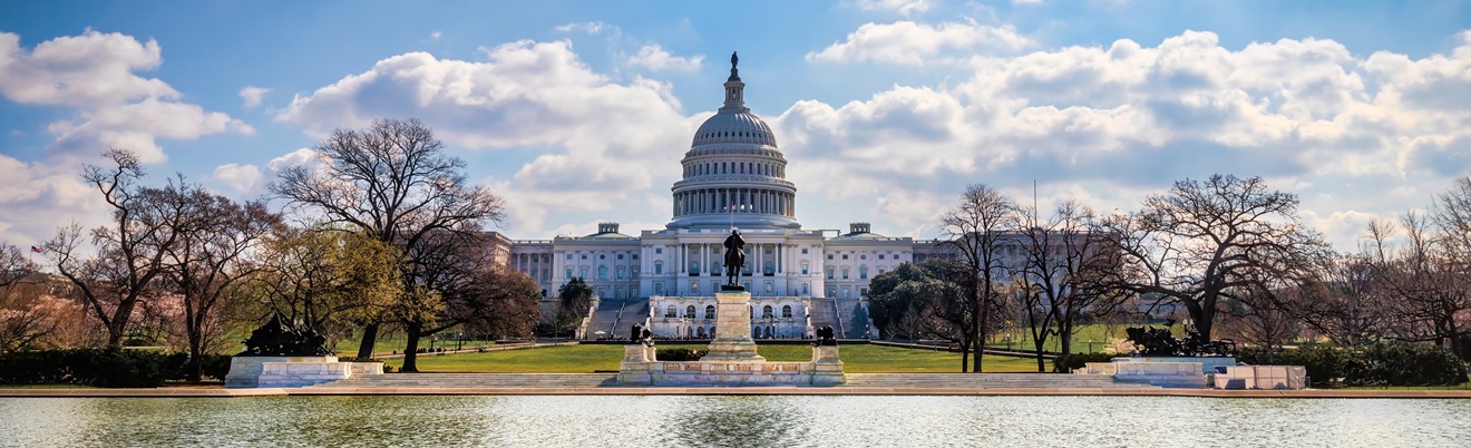 A cloudy sky rolls in behind the US Capitol building in Washington DC.