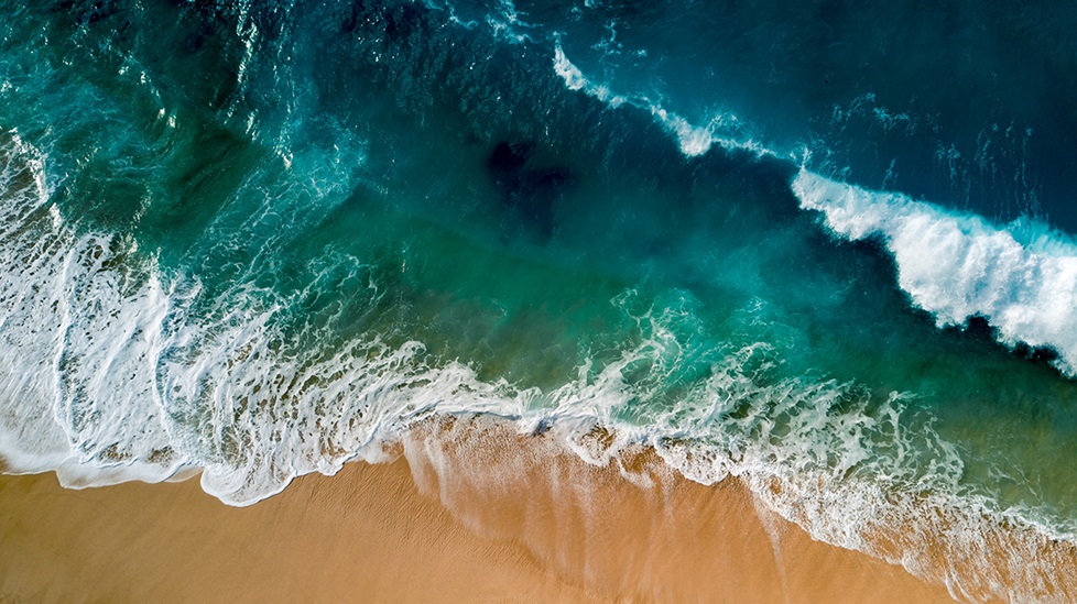 Waves crashing on shore in Waialua, United States