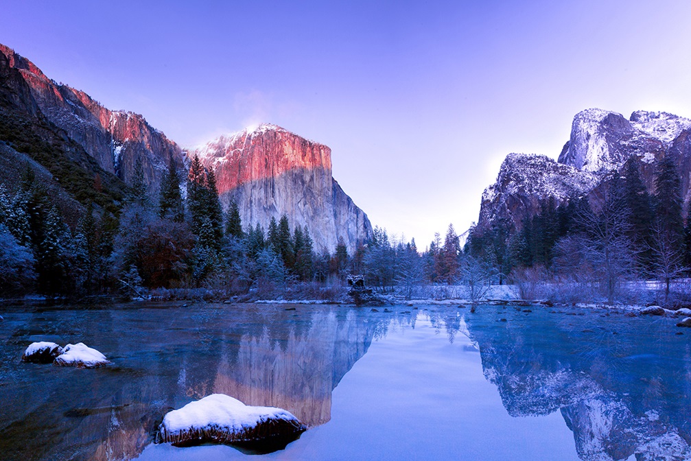 Lake with mountain reflection in Yosemite Valley, United States