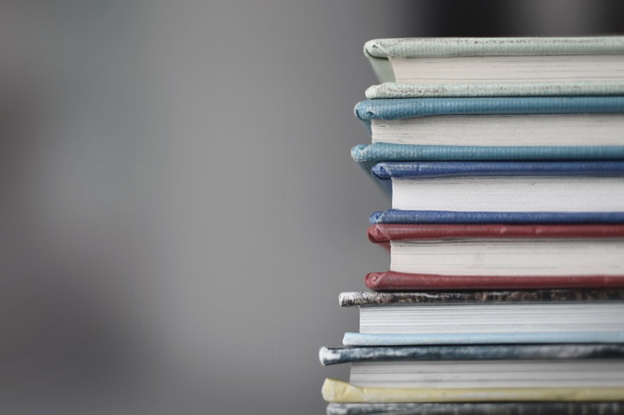  A stack of books on a blurred background