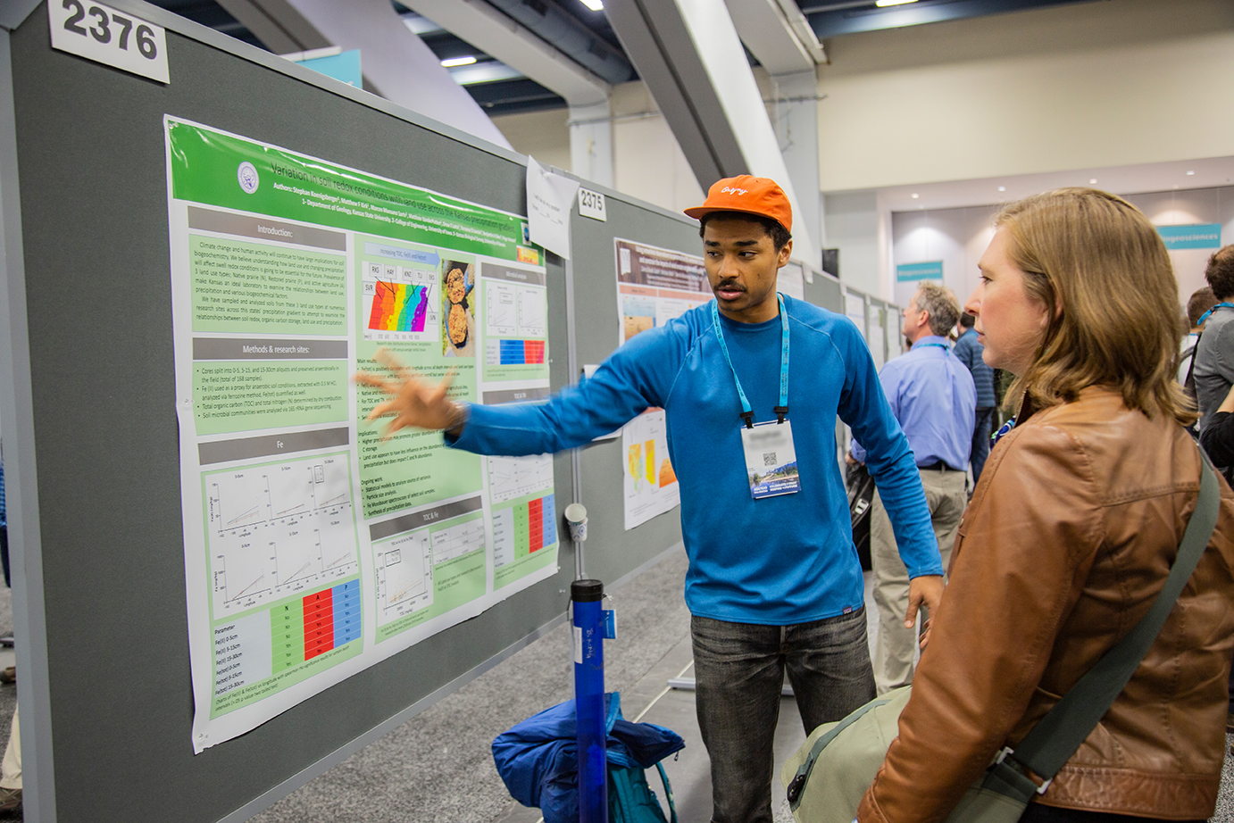 Attendee sharing poster during Fall Meeting