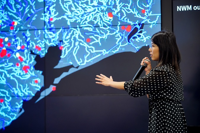 Woman presenting at AGU fall meeting 