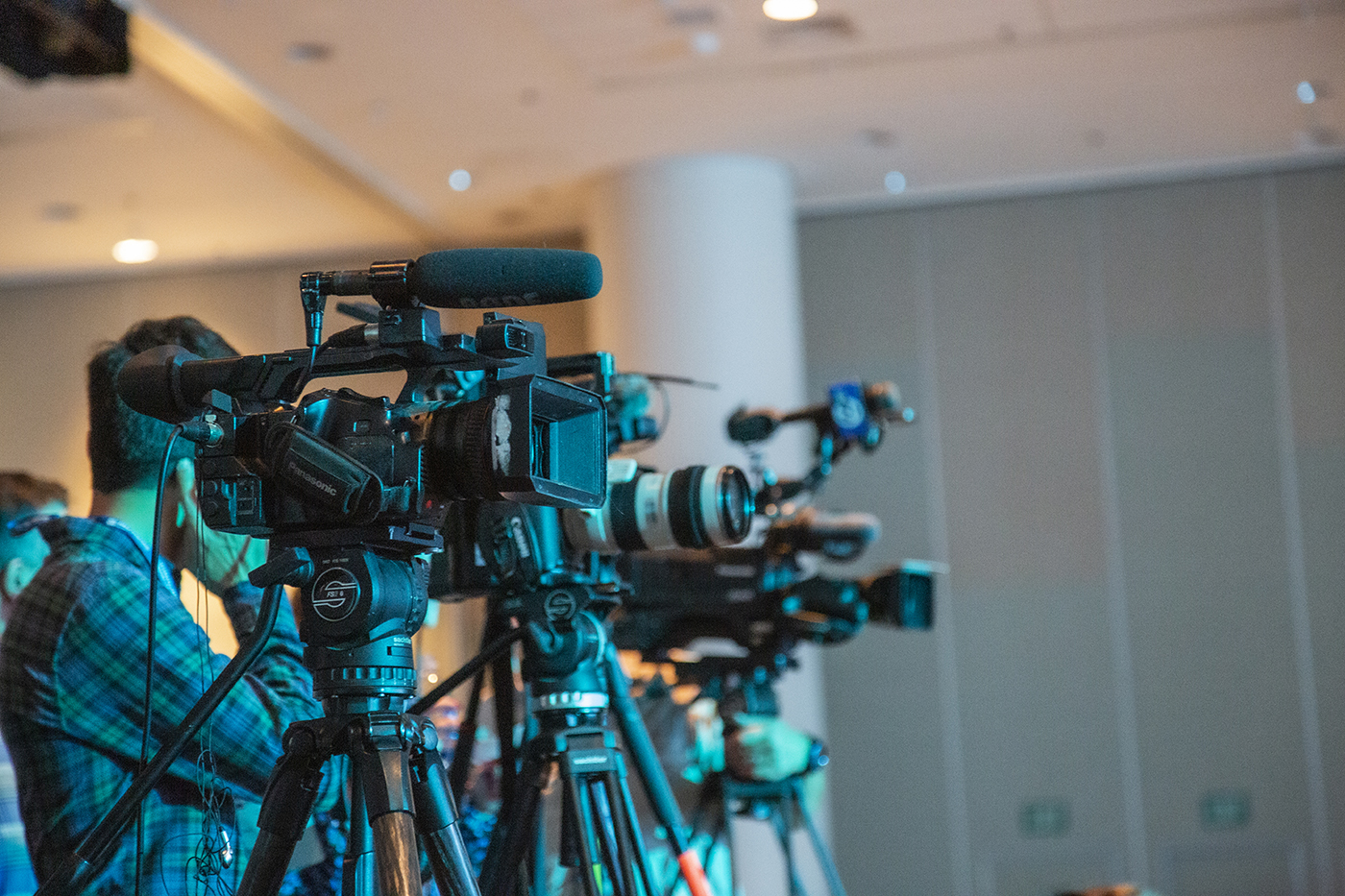 Photographers during the Bloomberg talk at Fall Meeting