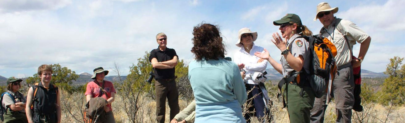 Interpretive guide speaking to a group