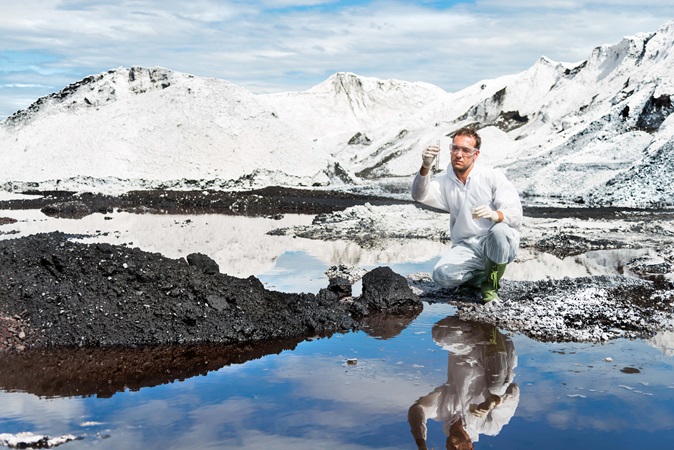 Man samples glacier water