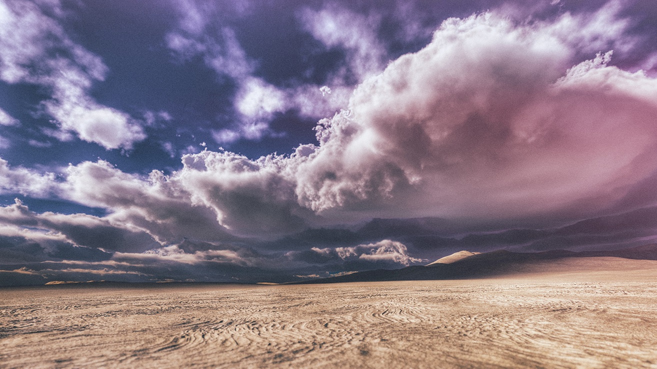 Dry earth with dramatic pink clouds