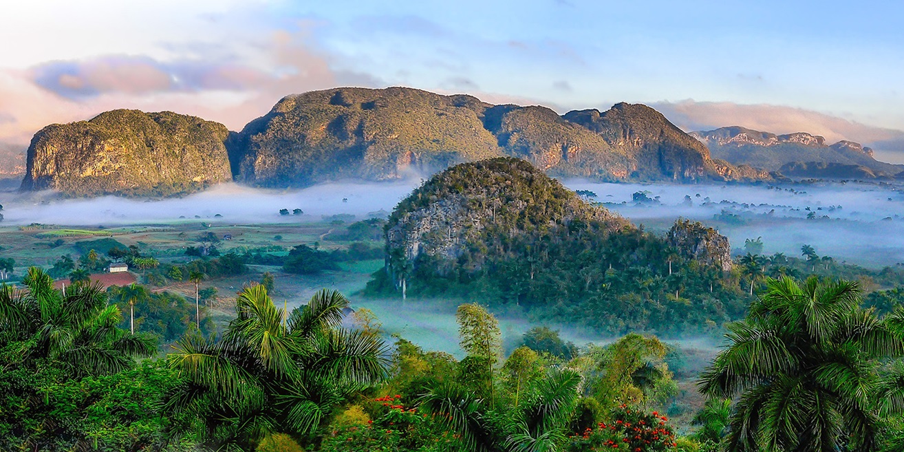 Hills above rainforest and mist in Cuba