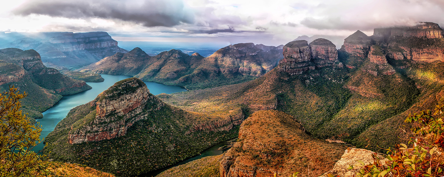 Aerial view of rocky cliffs with water below