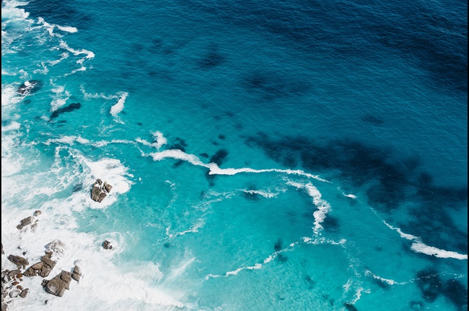 Waves crashing on shore at Cape Point, South Africa