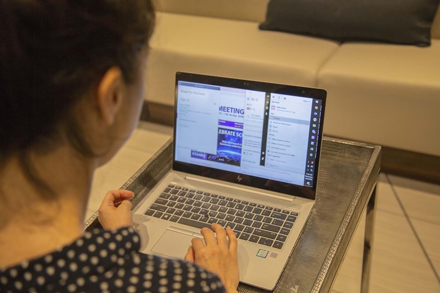 Woman searching on her computer Woman searching on her computer