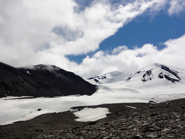 Glacier spilling out of a volcanic caldera somewhere in British Columbia
