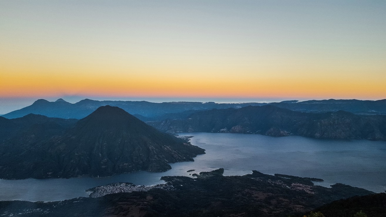 Water canals surrounded by mountains with sunset