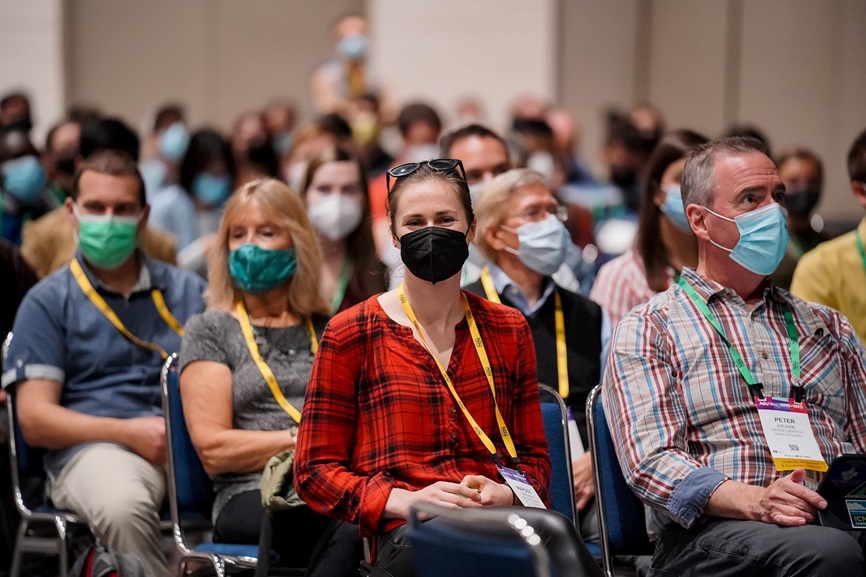 Audience of masked Fall Meeting attendees