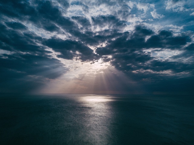 Ocean with sunrays on water