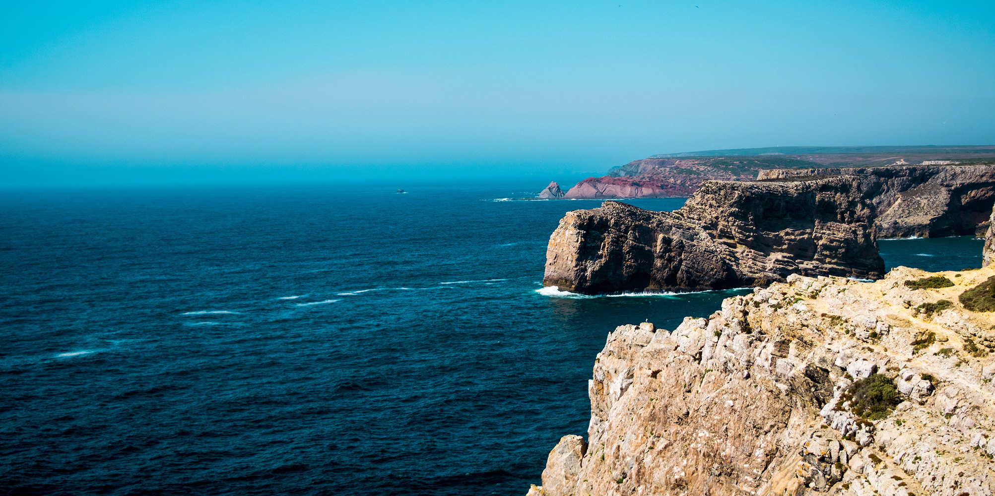 Ocean with rocky cliffs