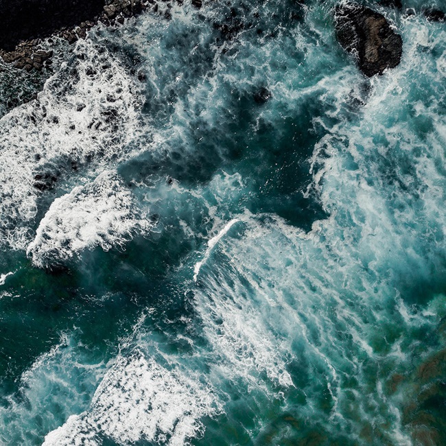 Above aerial view ocean waves