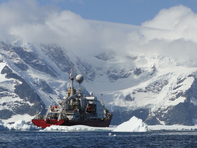 RRS James Clark Ross dodging icebergs in the southern Ocean in Antarctica