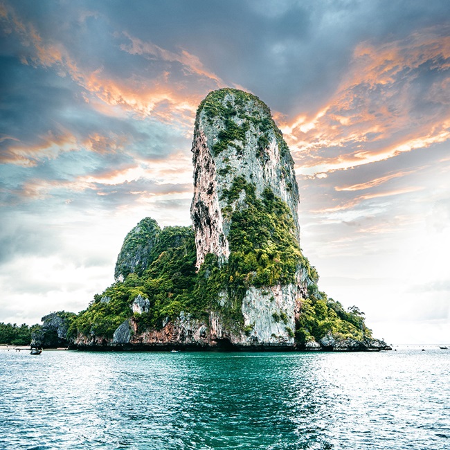 tropical island with a steep rock formation