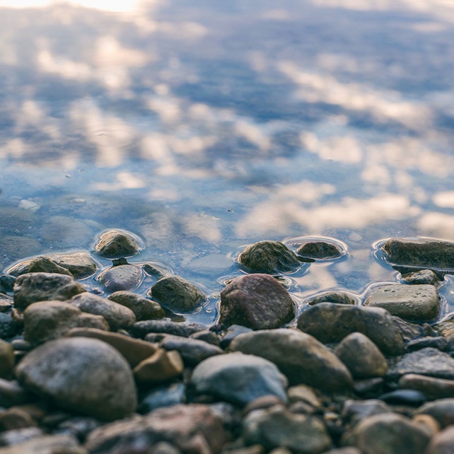 Pebble rocks piled up on the shore