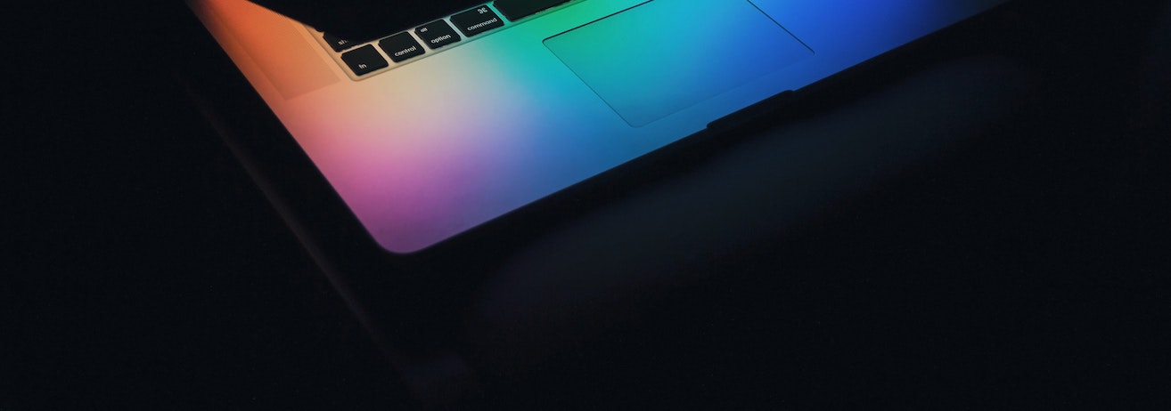 Mac computer with rainbow lighting