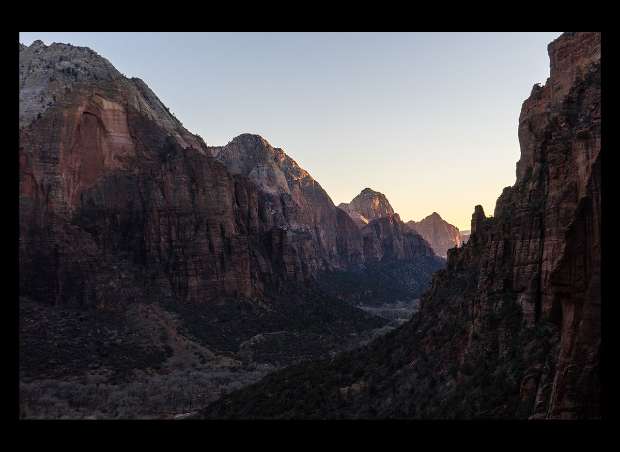 Valley with steep rocky cliffs