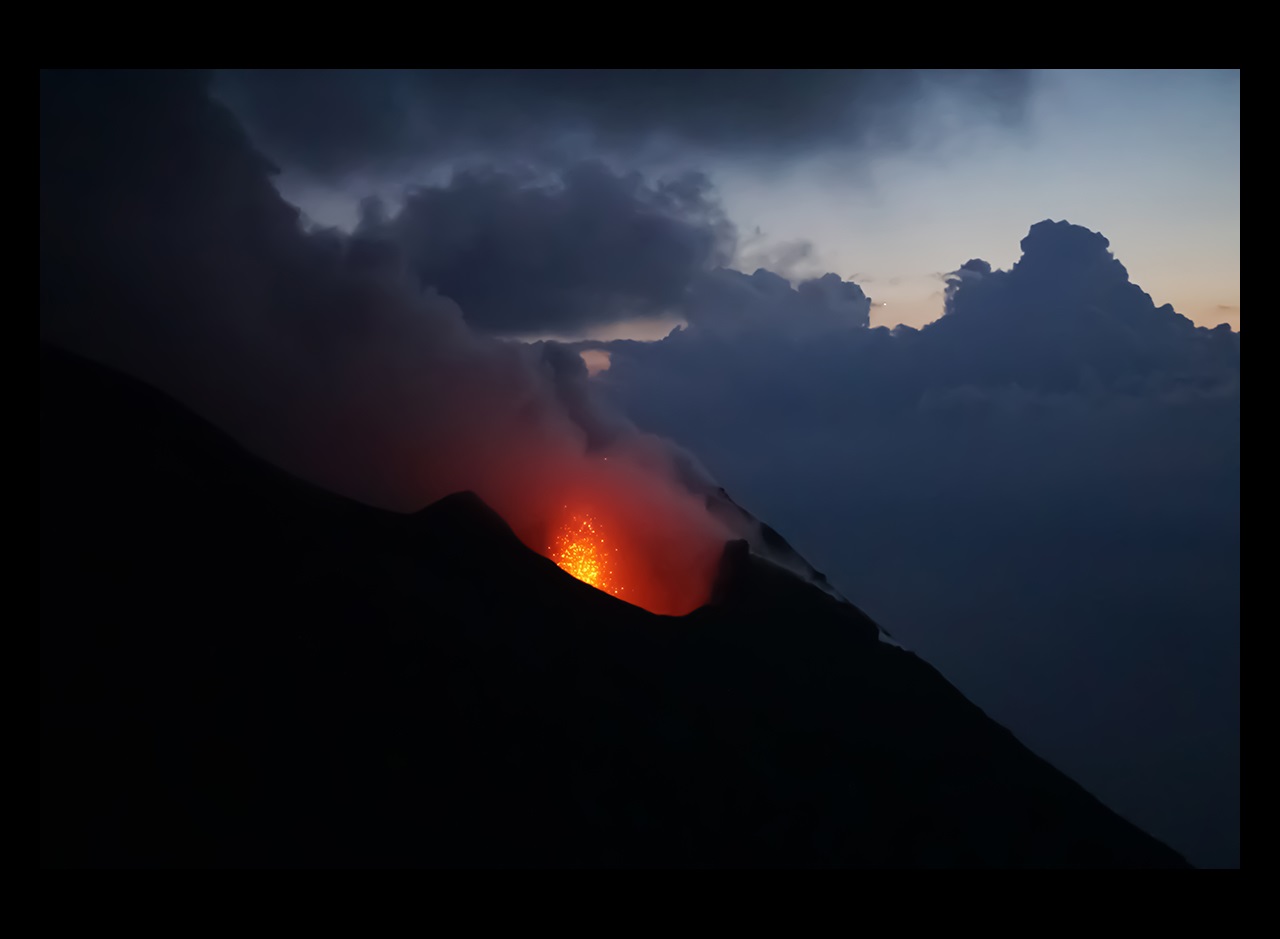Night view of lava from volcano