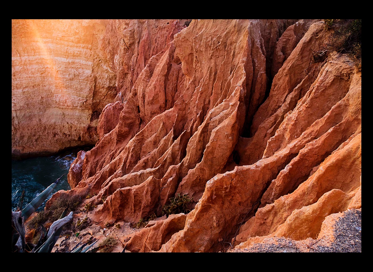 Rocky cliffs above the water