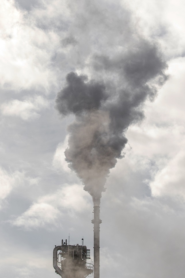 Vertical image of air pollution on cloudy day