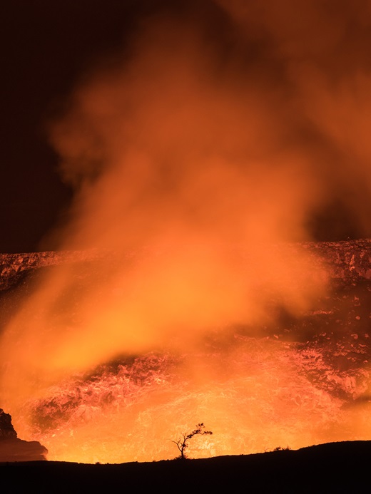 Night view of lava at Kilauea's crater, USA
