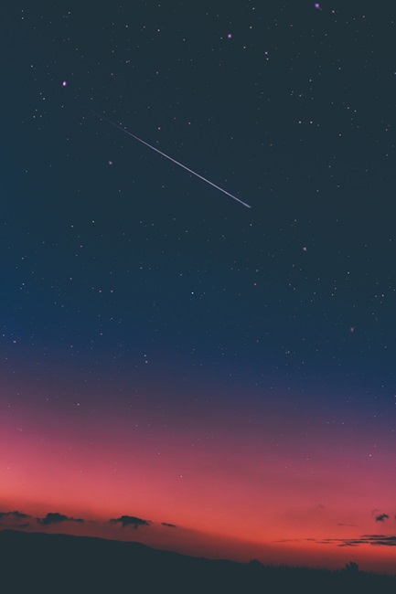 Night sky with shooting star in USA