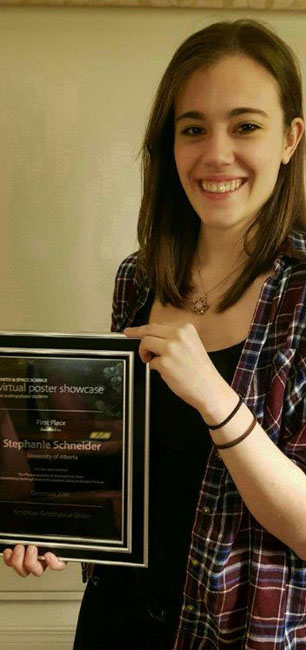 VPS Winner Stephanie Schneider holds her winner's plaque
