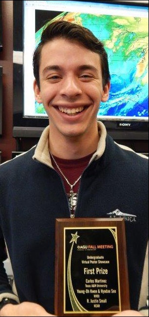 VPS winner Carlos Martinez holds his winner's plaque