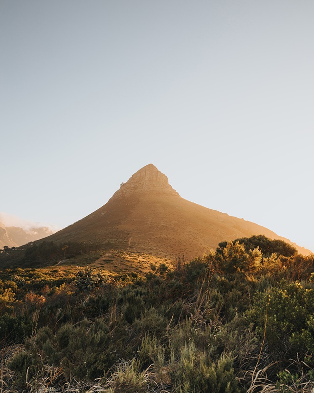 Sun shine on Lions head mountain in Cape Town