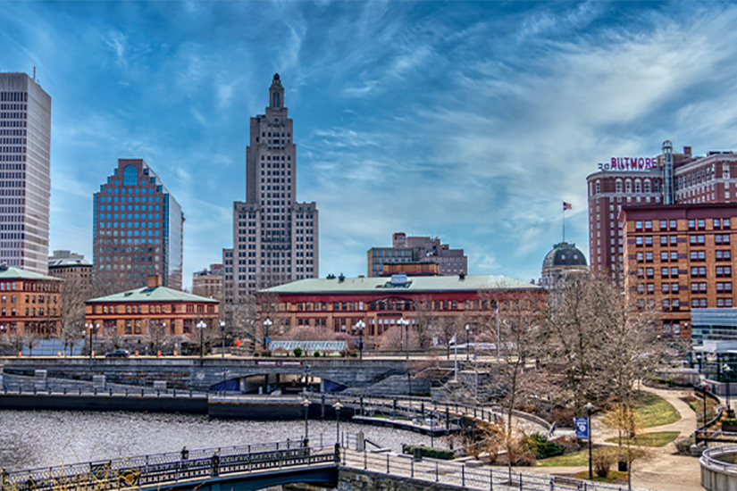 Downtown Providence, Rhode Island on a sunny day, with Waterplace Park in the foreground